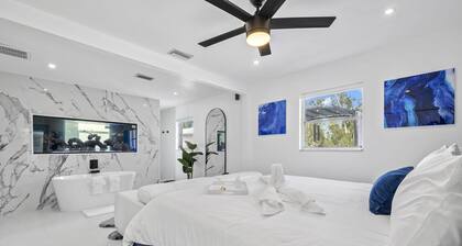 Luxury family friendly WATERFRONT home with a POOL, PLAYGROUND, FIREPIT & BEACH