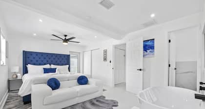 Luxury family friendly WATERFRONT home with a POOL, PLAYGROUND, FIREPIT & BEACH