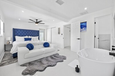 Luxury family friendly WATERFRONT home with a POOL, PLAYGROUND, FIREPIT & BEACH 