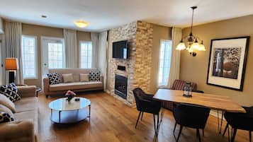 40-inch flat-screen TV with cable channels, TV, fireplace