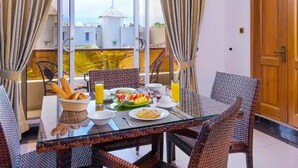 Habitación ejecutiva doble | Zona de estar