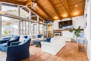 Smart TV, fireplace, books