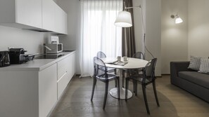 Basic Apartment | Living area | 55-inch flat-screen TV with satellite channels, TV - Italianway - Corso Como 11 (Milan)