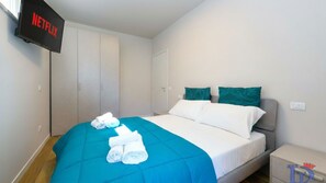 1 habitación, tabla de planchar con plancha, wifi gratis y ropa de cama 