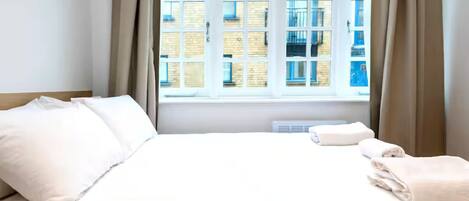 1 chambre, fer et planche à repasser, accès Internet, draps fournis