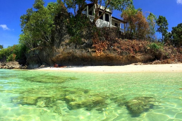 On the beach, white sand, beach towels