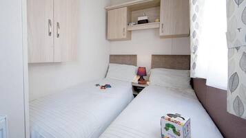 Apartemen, Beberapa Tempat Tidur | 4 kamar tidur, setrika/meja setrika, dan Wi-Fi gratis