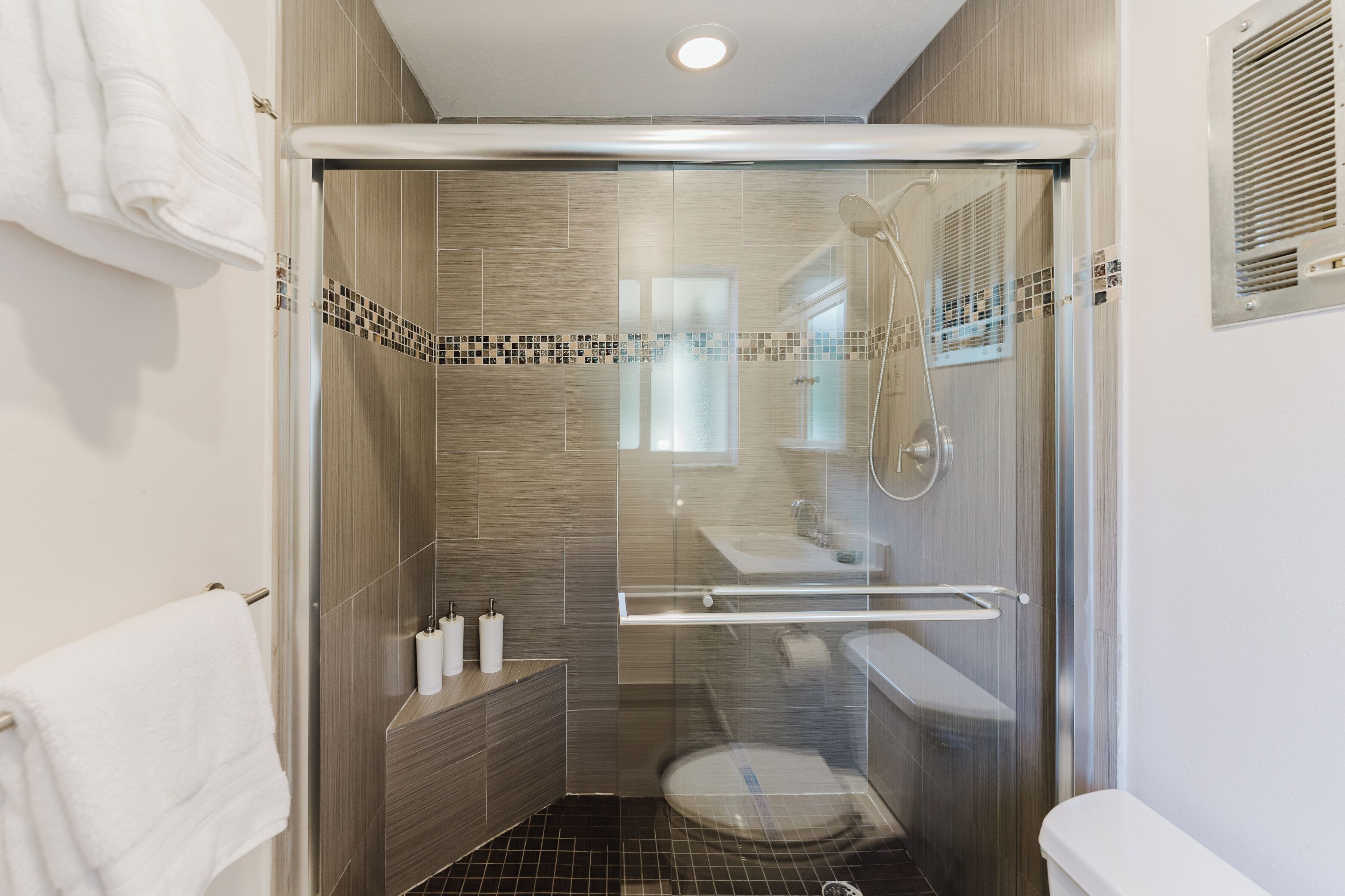 Bathtub, hair dryer, towels, soap