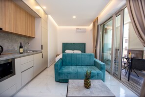 Basic Studio | Living area | Flat-screen TV - IN Property Apartments (Becici)
