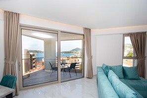 Leilighet – signature | Oppholdsområde | Flatskjerm-TV