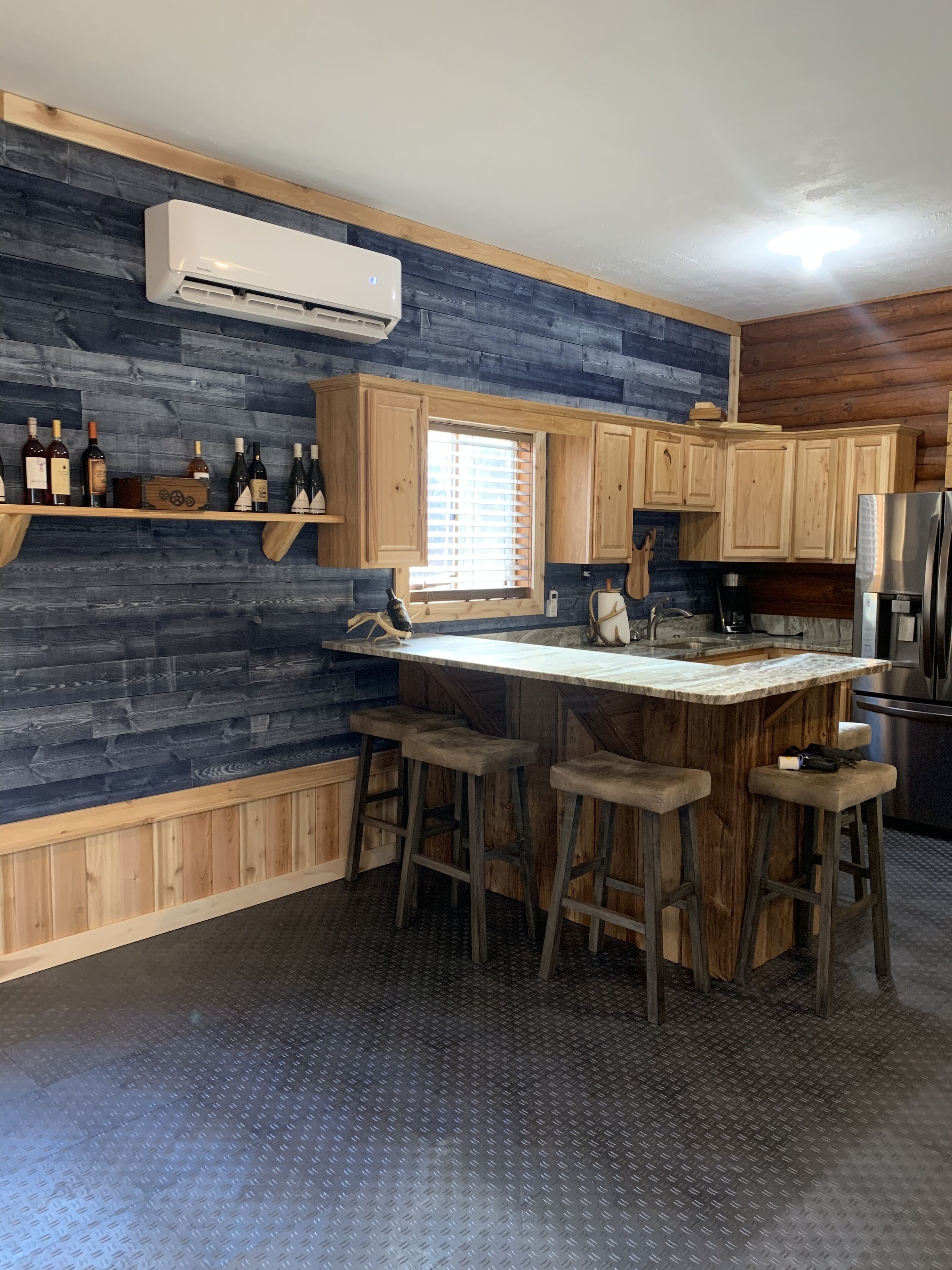 Tall Pines Lodge with private pond and sauna.