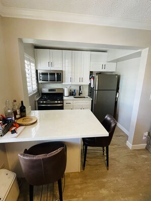 Microwave, oven, stovetop, coffee/tea maker