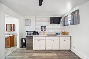 Fridge, microwave, stovetop, coffee/tea maker