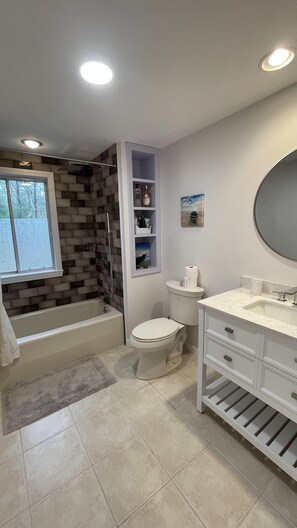Hair dryer, towels, soap, shampoo