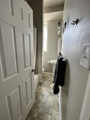 Hair dryer, towels, soap, toilet paper