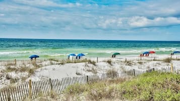 On the beach, sun-loungers