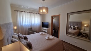 2 quartos, berço de viagem, Wi-Fi, roupa de cama