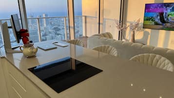 64-inch Smart TV with digital channels, TV, video-game console