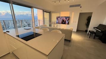 64-inch Smart TV with digital channels, TV, video game console