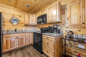 Fridge, microwave, oven, stovetop - Romantic hot tub cabin close to all the attractions. (Pigeon Forge)