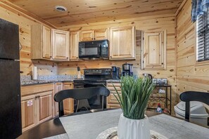 Fridge, microwave, oven, stovetop - Romantic hot tub cabin close to all the attractions. (Pigeon Forge)