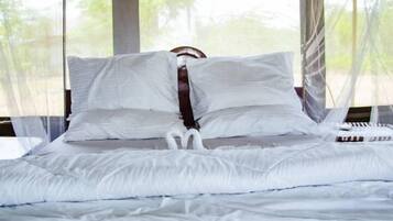 Luxury Tent | In-room safe, individually decorated, desk, blackout drapes