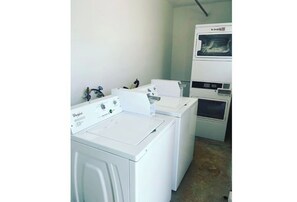 Convenient laundry facilities feature two washers and a dryer for guest use.