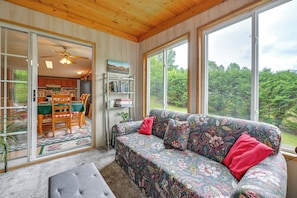 TV, fireplace, books