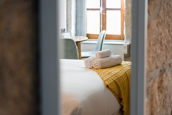 Desk, iron/ironing board, internet, bed sheets