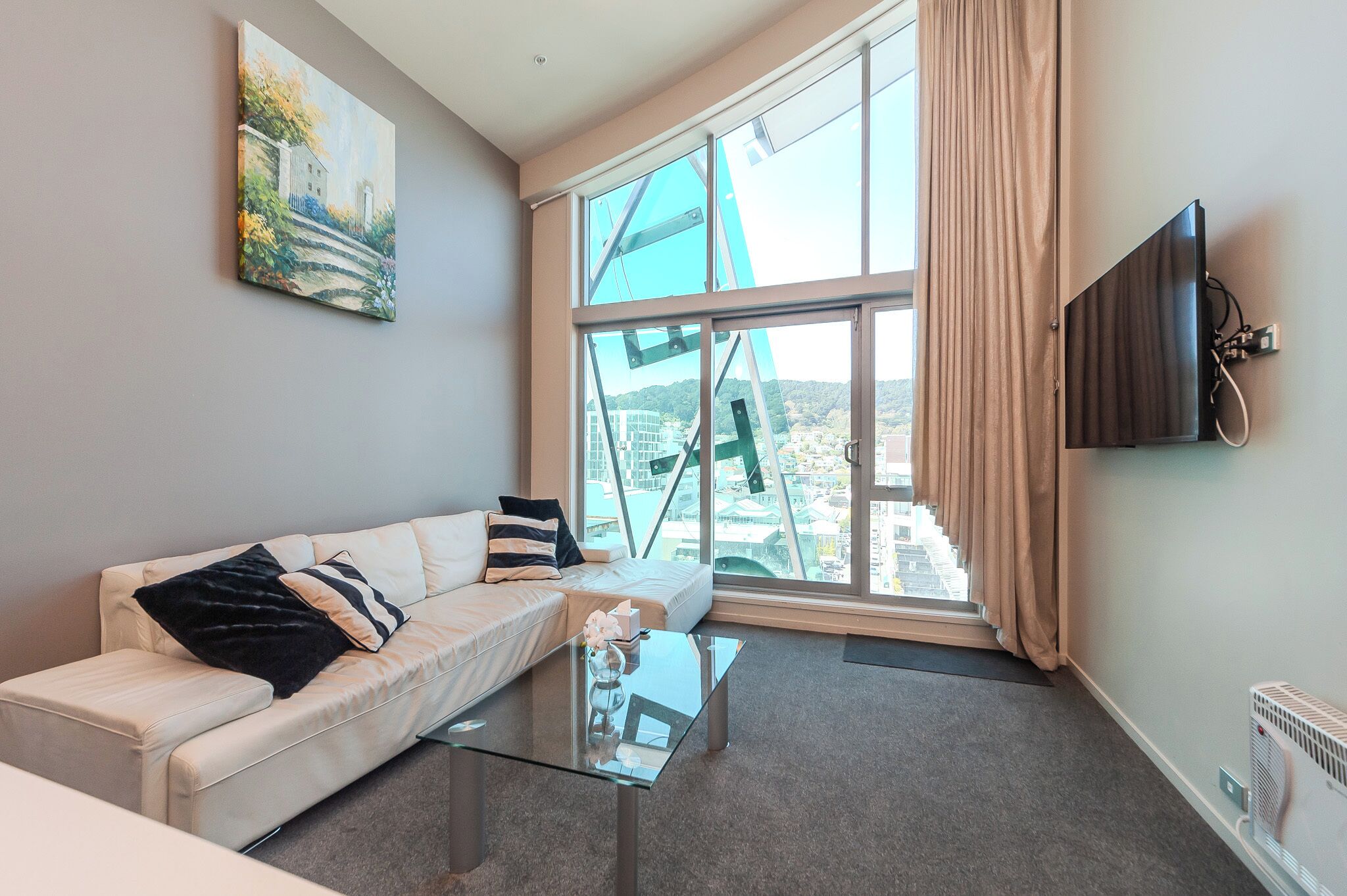 Penthouse Two | Living area | Flat-screen TV
