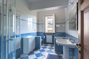 Bathtub, hair dryer, bidet
