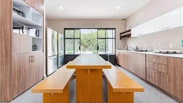 Fridge, microwave, stovetop, coffee/tea maker