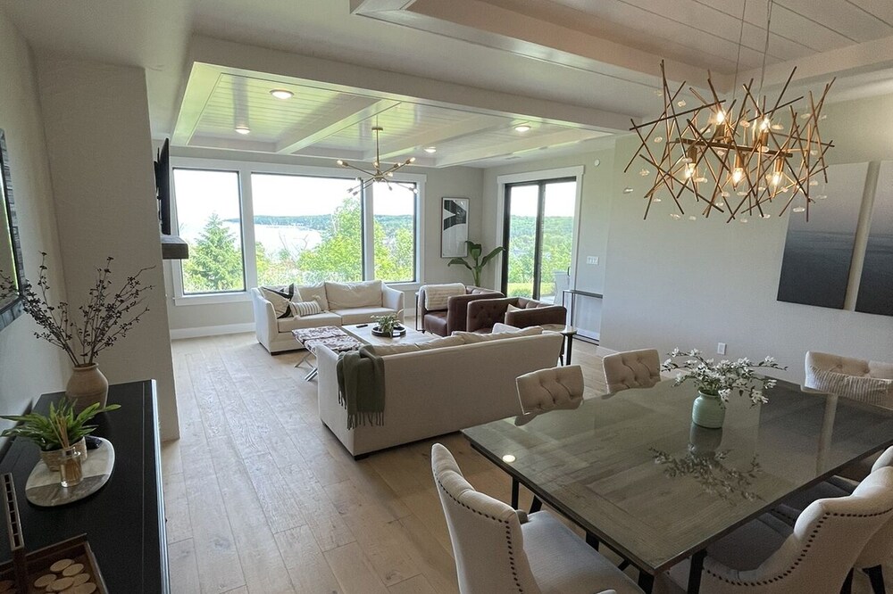 Overlook Downtown in this New Adult Only Condo with a Beautiful Water View!