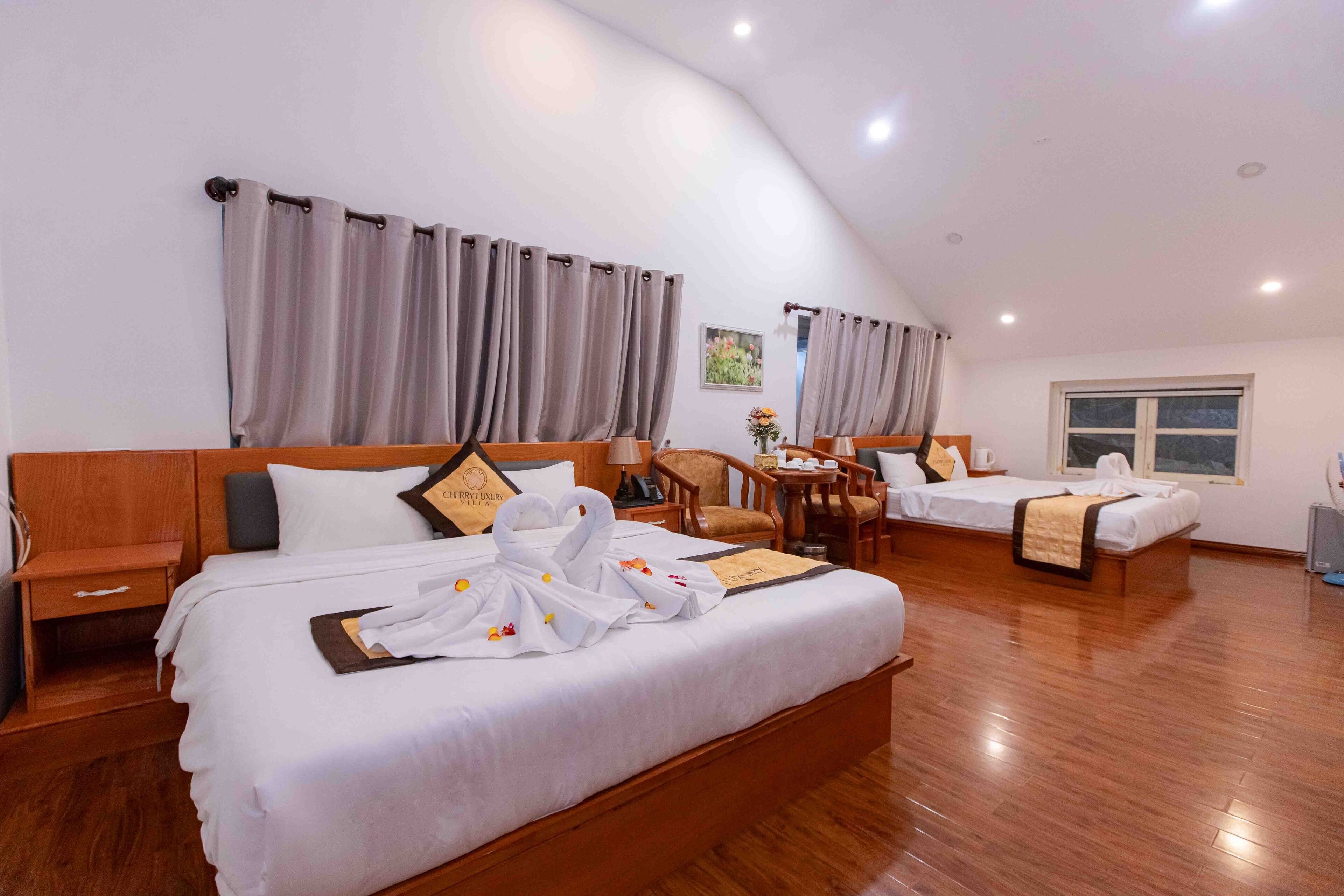 Family Room, Multiple Beds, City View | Premium bedding, minibar, in-room safe, individually furnished