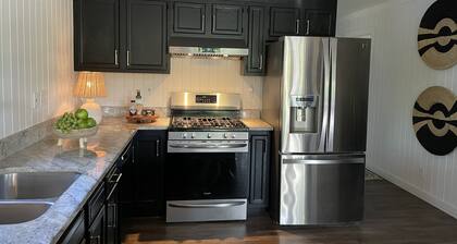 Beautiful Private Country Home on 23 acres. Sleeps 9. Pond, dock, hiking trails.