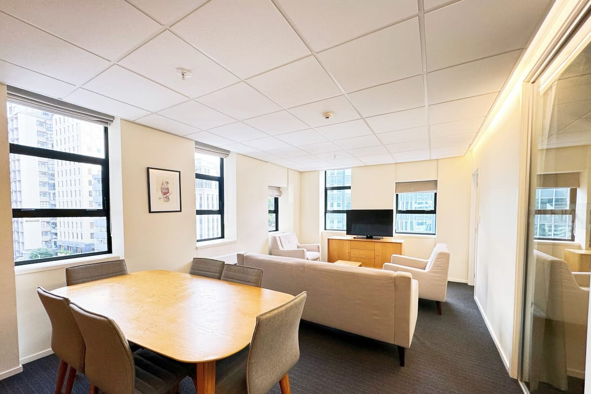 Family Apartment, 3 Bedrooms, Kitchen, City View | Living area | 32-inch TV with cable channels