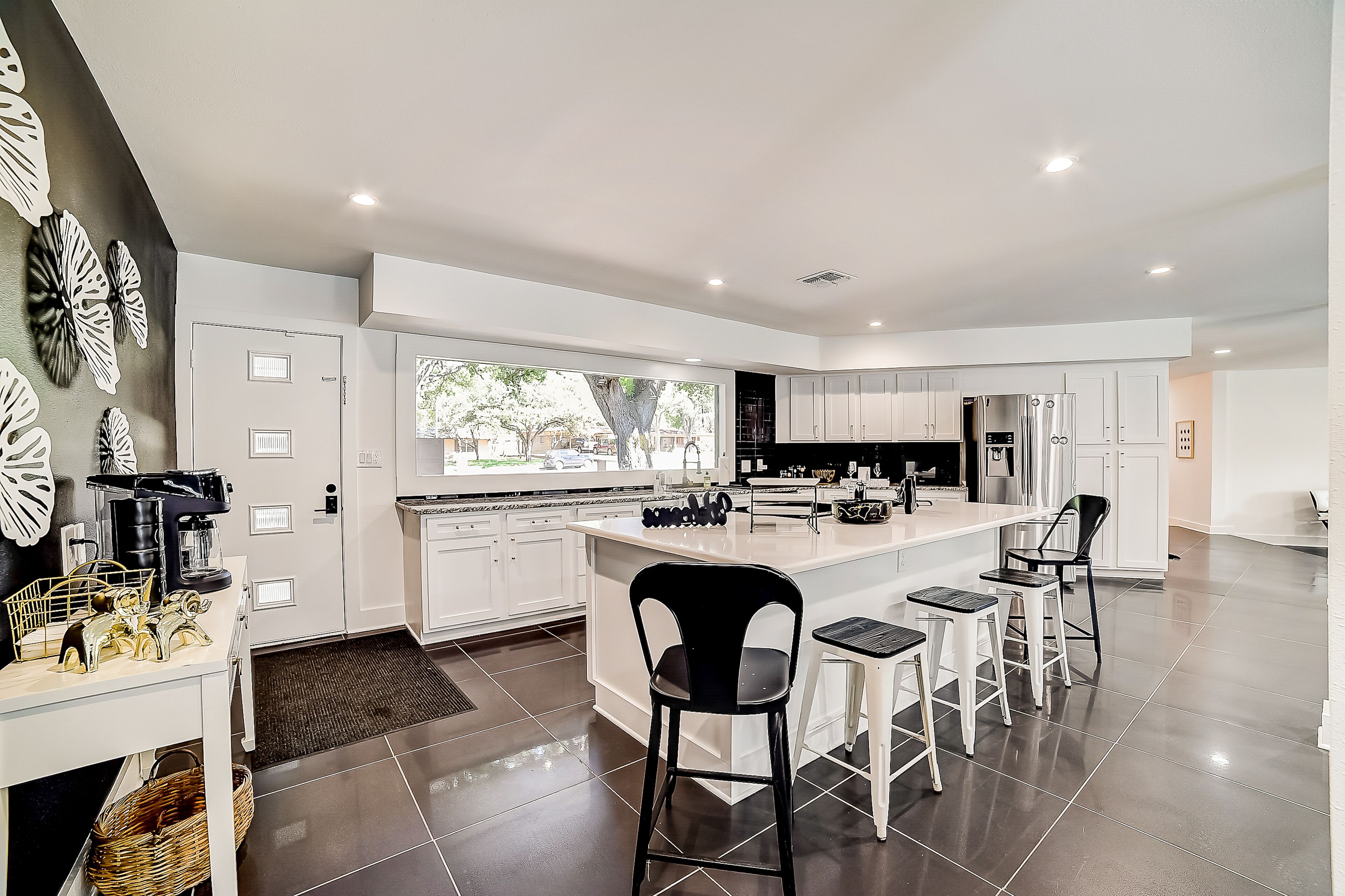 Modern beauty with enclosed yard, pool, playset, grill, fireplace, piano, & AC