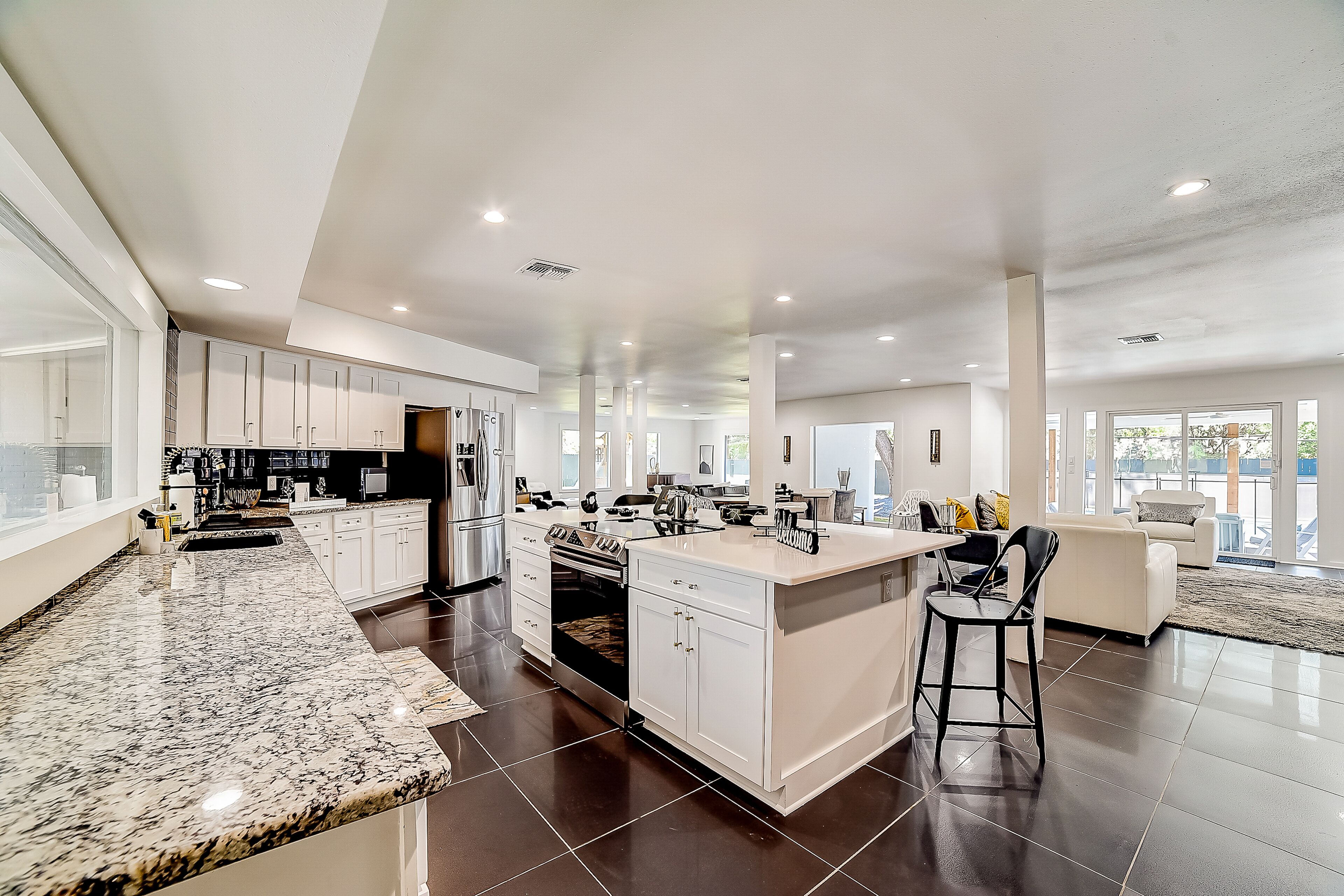 Modern beauty with enclosed yard, pool, playset, grill, fireplace, piano, & AC