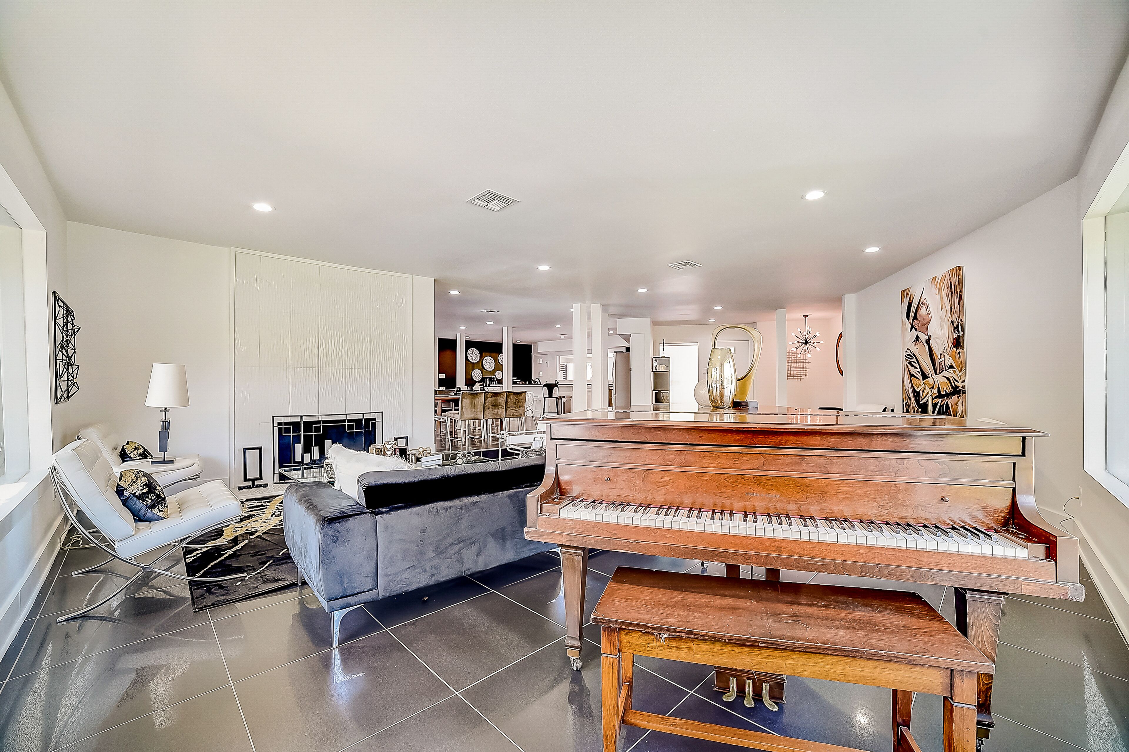 Modern beauty with enclosed yard, pool, playset, grill, fireplace, piano, & AC