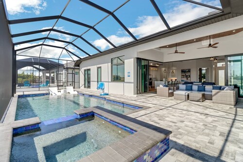 Luxe Cape Coral Waterfront Pool Home | Spa, Ping Pong, Home Gym & Pickleball Nearby