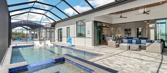 Luxe Cape Coral Waterfront Pool Home | Spa, Ping Pong, Home Gym & Pickleball Nearby