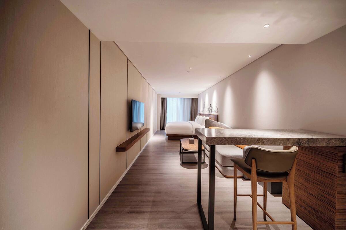 Kamar (行政大床房) | Seprai premium, selimut bulu angsa, dan bantalan ekstra lembut