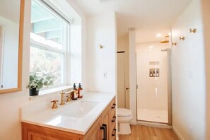 Hair dryer, towels, soap, shampoo