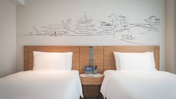 Down duvets, memory-foam beds, free minibar, in-room safe