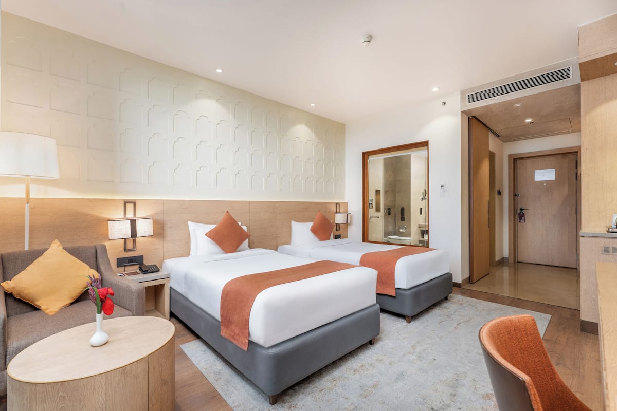 Deluxe Twin Room, 2 Twin Beds, Non Smoking | Hypo-allergenic bedding, minibar, in-room safe, individually decorated