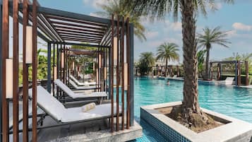 Outdoor pool, open 9:00 AM to 8:00 PM, free pool cabanas