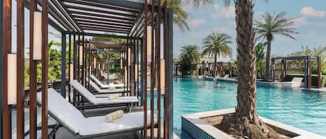 Outdoor pool, open 9:00 AM to 8:00 PM, free cabanas