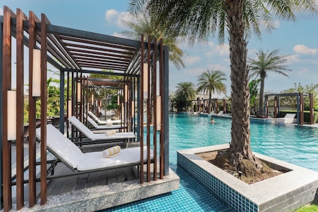 Outdoor pool, open 9:00 AM to 8:00 PM, free pool cabanas. Siddhartha Vilasa