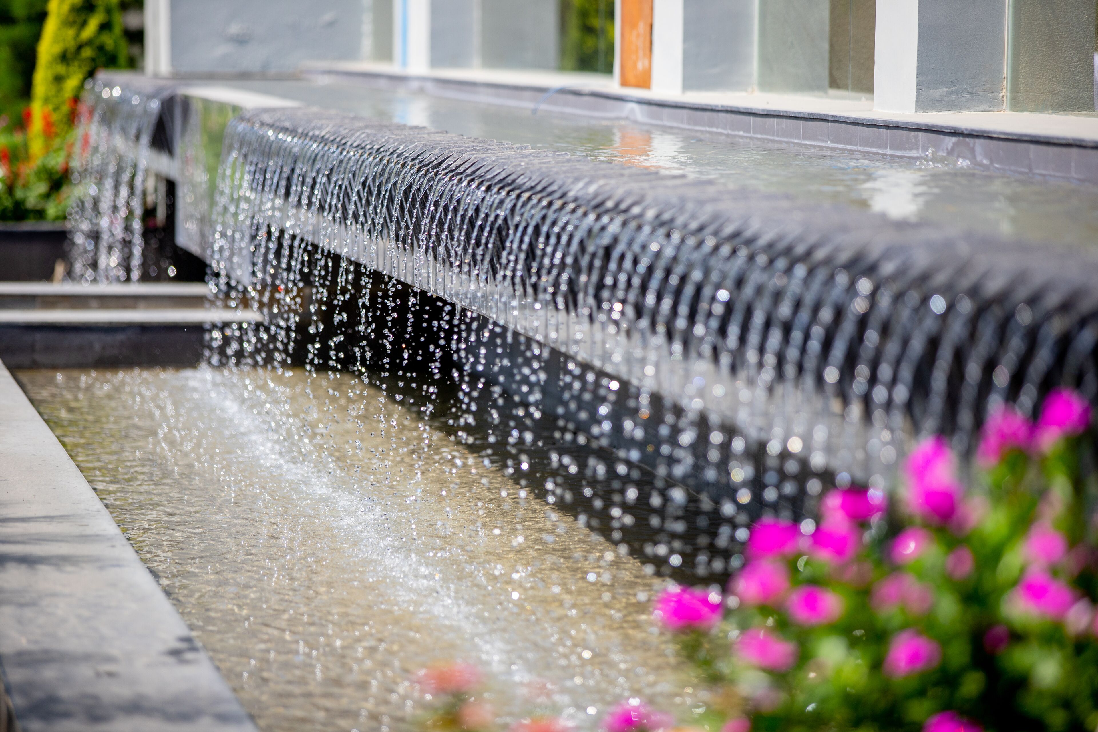 A water feature with multiple tiers of cascading water.