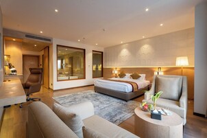 Executive Double Room | Living area | 52-inch LED TV with satellite channels, TV, fireplace